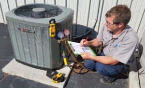 HVAC technician performing furnace repair in Gloversville NY