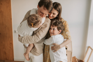 A happy family in their well-ventilated home in Gloversville.